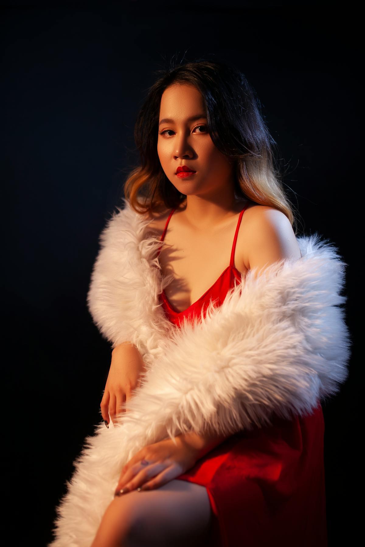 Luxury fur and evening dress studio shot
