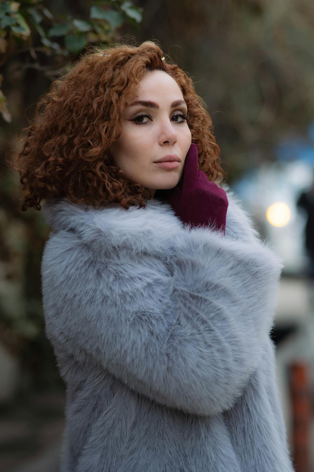 Grey Karakul fur coat portrait